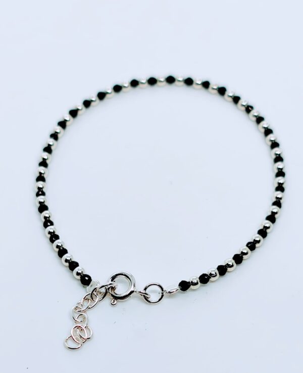 Cristalitos negros / bolas de plata